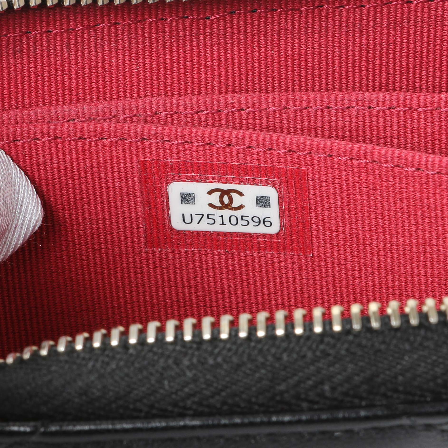 Exclusive Chanel Black Quilted Lambskin Zip Around 19 Coin Purse — Lifestyle View