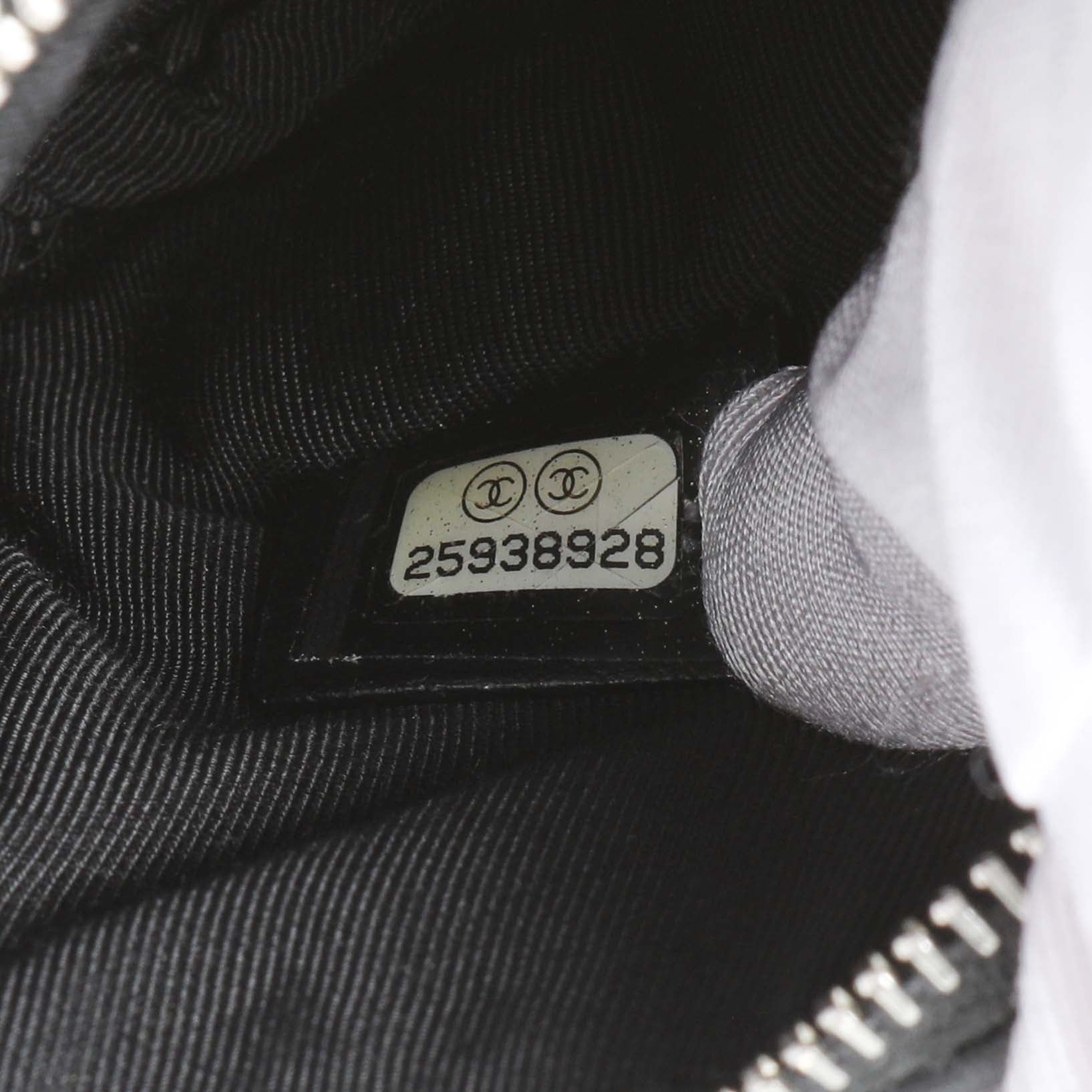 Exclusive Chanel Black Calfskin Tassel Small Cosmetic Pouch — Lifestyle View