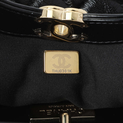 Exclusive Chanel Black Shiny Crumpled Calfskin Quilted Mini 31 Shopping Bag — Lifestyle View