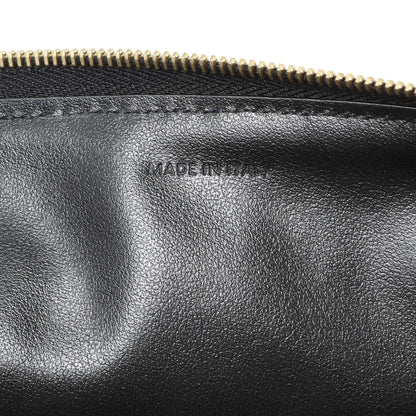 Exclusive Celine Black Calfskin Quilted C Charm Pouch — Lifestyle View