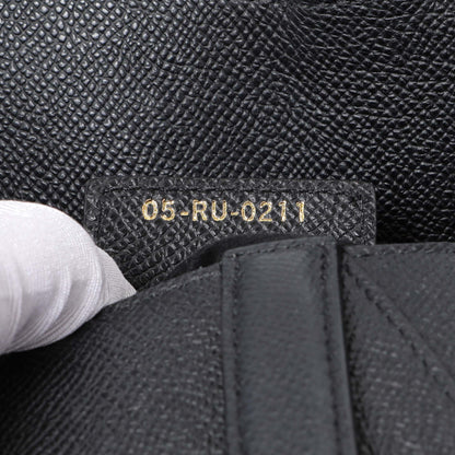 Exclusive Christian Dior Black Grained Calfskin Saddle Bag — Lifestyle View