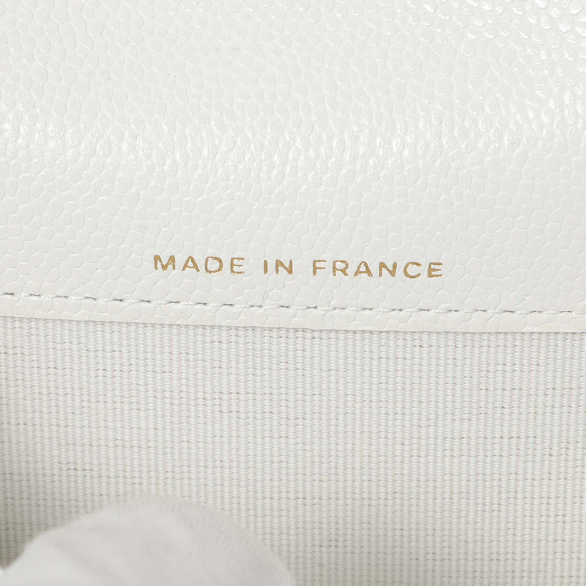 Exclusive Chanel White Quilted Caviar Flap Card Holder — Lifestyle View