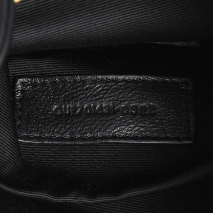 Exclusive Saint Laurent Black Lambskin Matelasse Monogram Joe Nano Bucket Bag — Lifestyle View