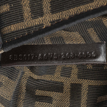 Exclusive Fendi Fabric Jacquard FF 1974 Mini Baguette — Lifestyle View