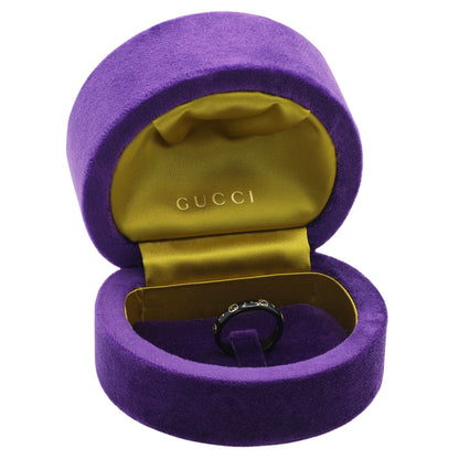 Exclusive Gucci 18K Yellow Gold Black Synthetic Corundum Interlocking G Icon Ring — Top View