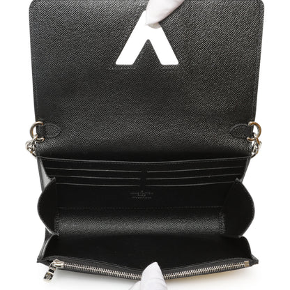 Exclusive Louis Vuitton Reverse Monogram Studded Night Lights Twist Chain Wallet — Detail View