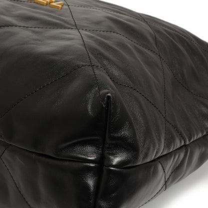 Exclusive Chanel Shiny Black Quilted Shiny Calfskin Large Chanel 22 — Detail View