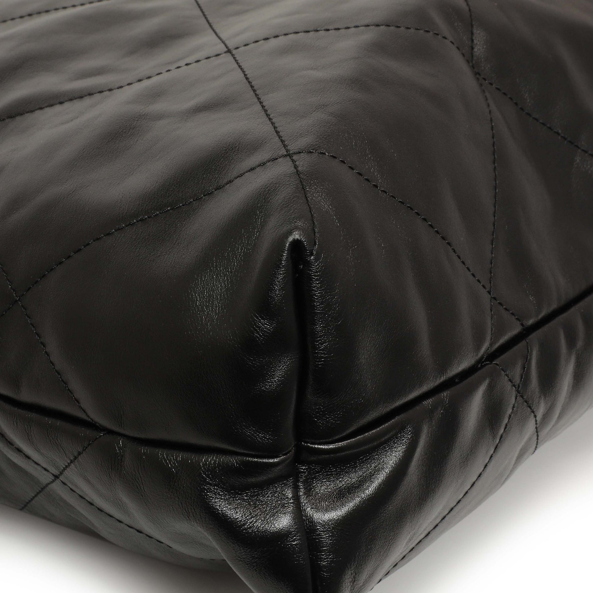 Exclusive Chanel Shiny Black Quilted Shiny Calfskin Large Chanel 22 — Lifestyle View