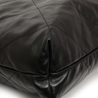 Exclusive Chanel Shiny Black Quilted Shiny Calfskin Large Chanel 22 — Lifestyle View
