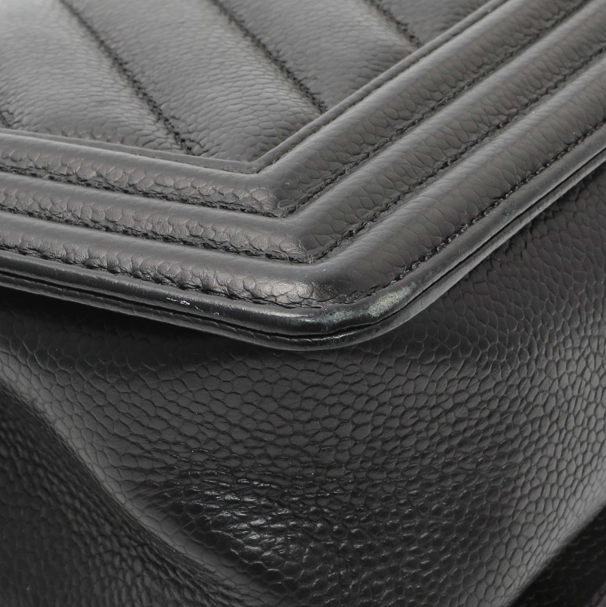 Exclusive Chanel Black Chevron Quilted Caviar Medium Boy Flap — Lifestyle View