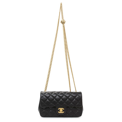 Exclusive Chanel Black Mini Rectangular Flap Bag with Camellia Adjusting Chain — Front View