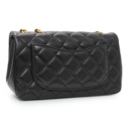 Exclusive Chanel Black Mini Rectangular Flap Bag with Camellia Adjusting Chain — Back View