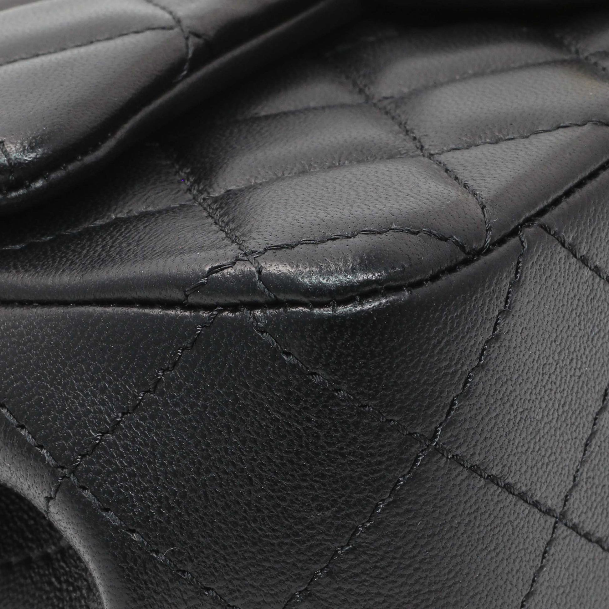 Exclusive Chanel Black Mini Rectangular Flap Bag with Camellia Adjusting Chain — Detail View