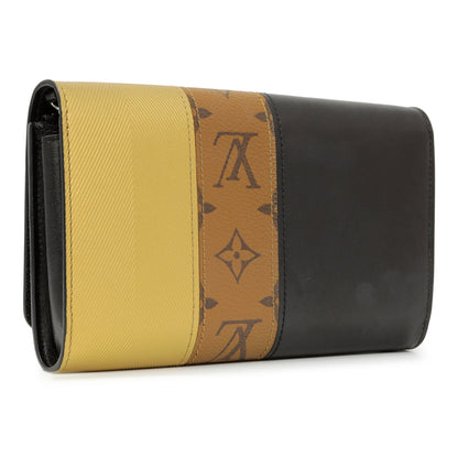 Exclusive Louis Vuitton Reverse Monogram Studded Night Lights Twist Chain Wallet — Side View