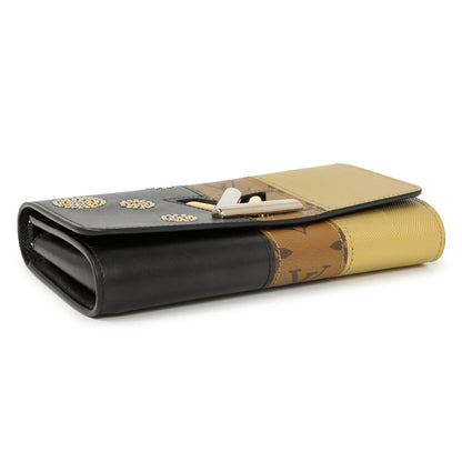 Exclusive Louis Vuitton Reverse Monogram Studded Night Lights Twist Chain Wallet — Back View