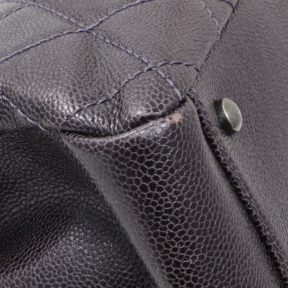 Exclusive Chanel Purple Iridescent Caviar Quilted Chic Shopping Tote — Lifestyle View