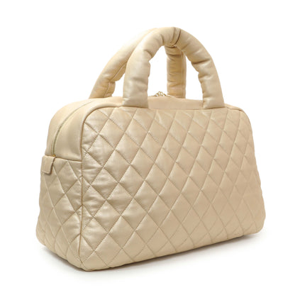 Exclusive Chanel Light Gold Quilted Lambskin Coco Cocoon Bowler — Side View