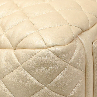 Exclusive Chanel Light Gold Quilted Lambskin Coco Cocoon Bowler — Lifestyle View