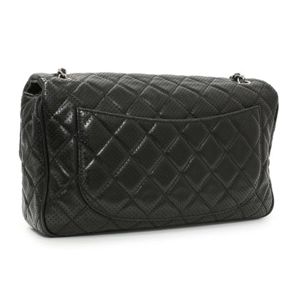 Exclusive Chanel Black Perforated Lambskin Punch Flap — Side View
