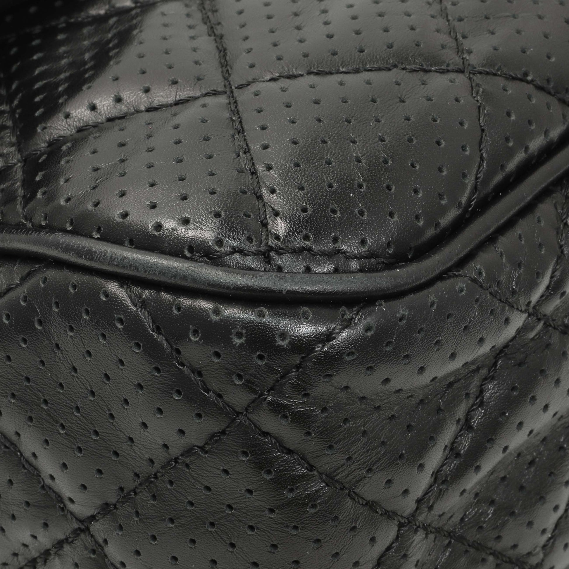 Exclusive Chanel Black Perforated Lambskin Punch Flap — Top View
