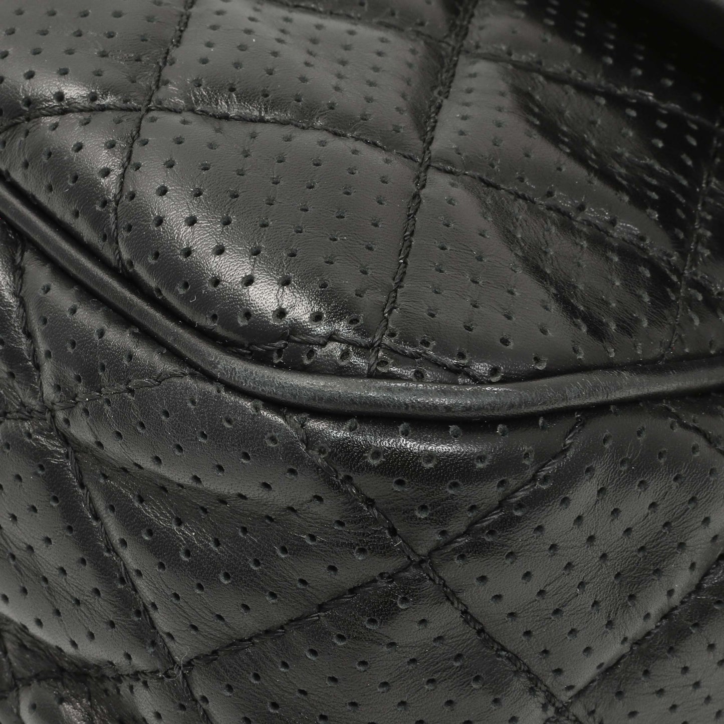 Exclusive Chanel Black Perforated Lambskin Punch Flap — Detail View