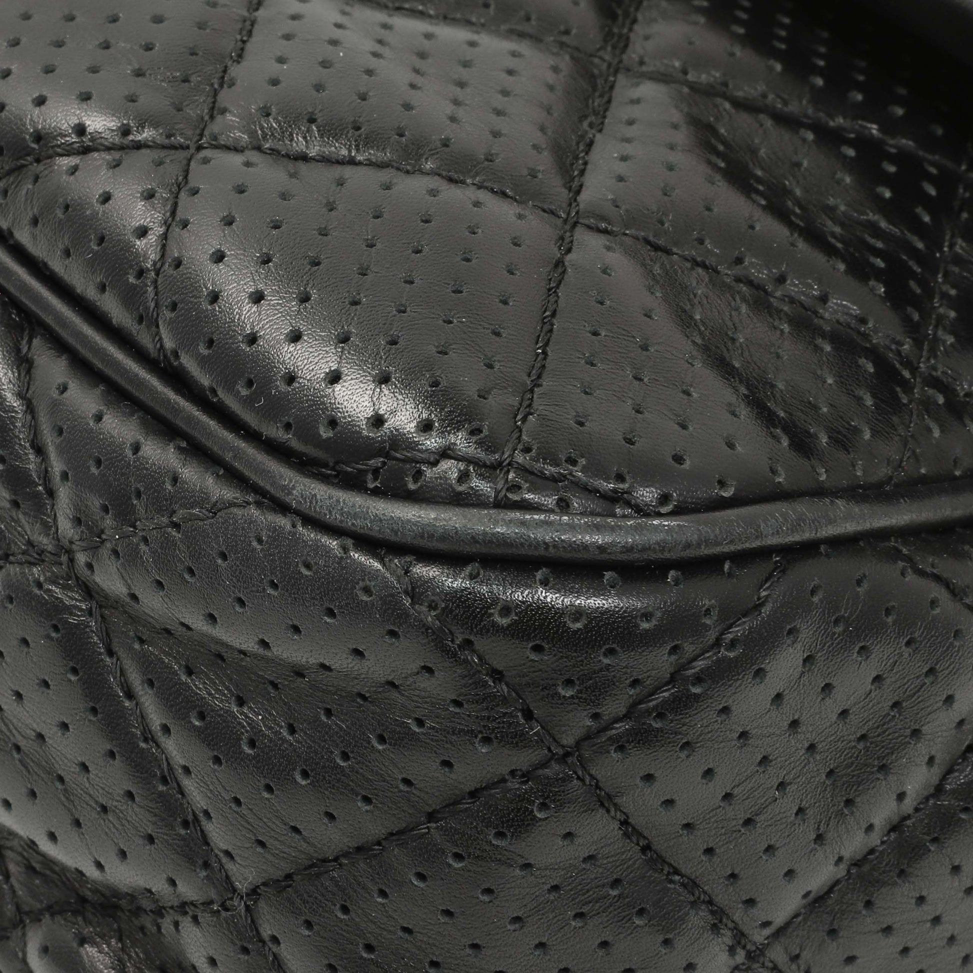 Exclusive Chanel Black Perforated Lambskin Punch Flap — Detail View