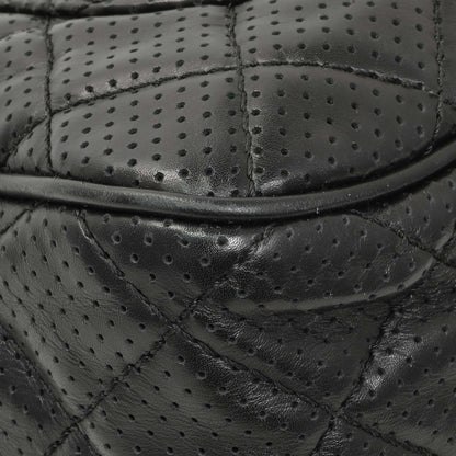 Exclusive Chanel Black Perforated Lambskin Punch Flap — Lifestyle View