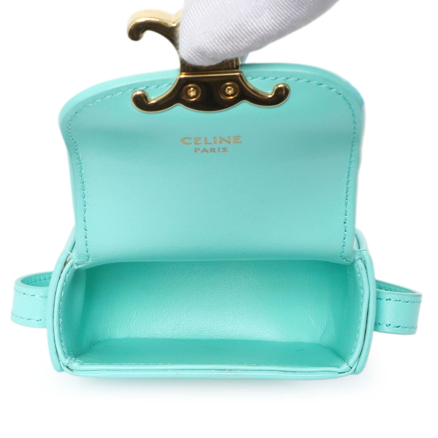 Exclusive Celine Turquoise Shiny Calfskin Triomphe Airpods Case — Detail View