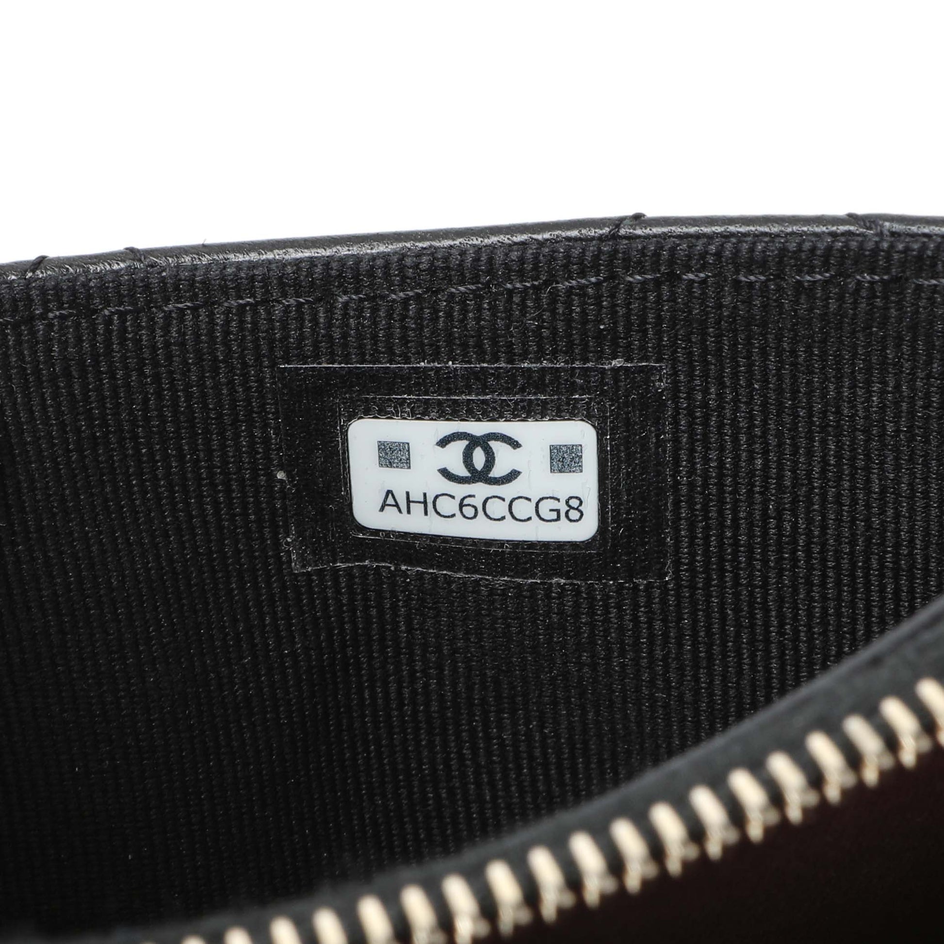 Exclusive Chanel Black Quilted Lambskin CC Zip Around Card Holder — Lifestyle View