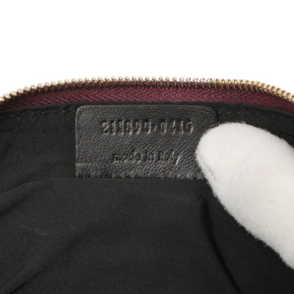 Exclusive Saint Laurent Purple Patent Y-Mail Cosmetic Case — Lifestyle View