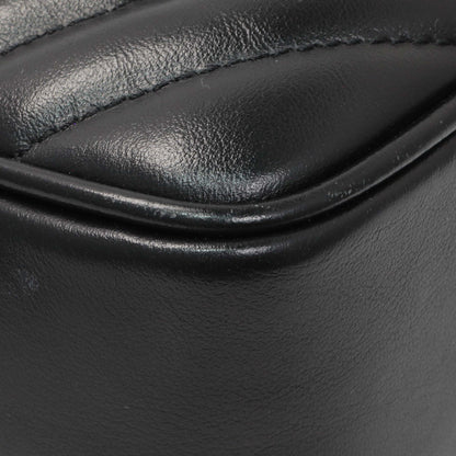 Exclusive Saint Laurent Black Calfskin Matelasse Monogram Lou Camera Bag — Lifestyle View
