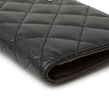 Exclusive Chanel Black Quilted Caviar Yen Wallet — Lifestyle View