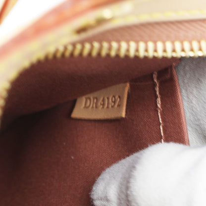 Exclusive Louis Vuitton Rose Velours Vernis Brea MM — Lifestyle View
