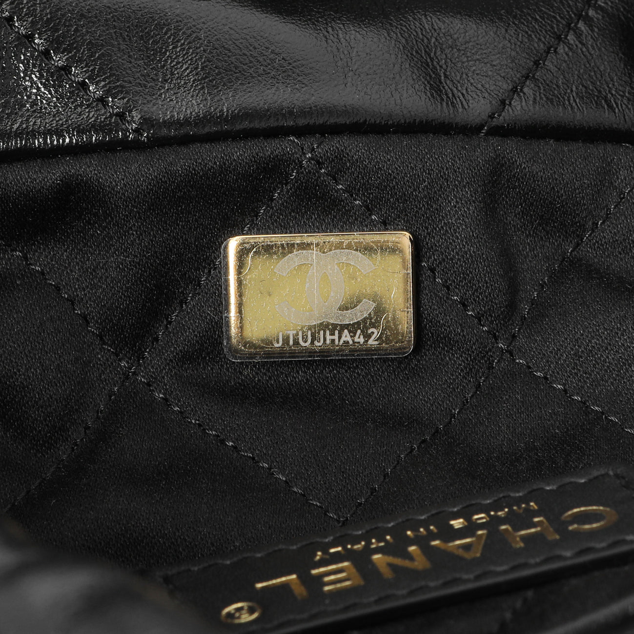 Exclusive Chanel Black Quilted Shiny Calfskin Small Chanel 22 — Lifestyle View