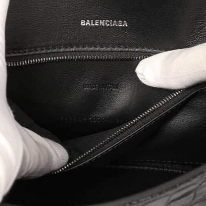 Exclusive Balenciaga Black Monochrome Crocodile Embossed Calfskin Small Hourglass Top Handle Bag — Lifestyle View