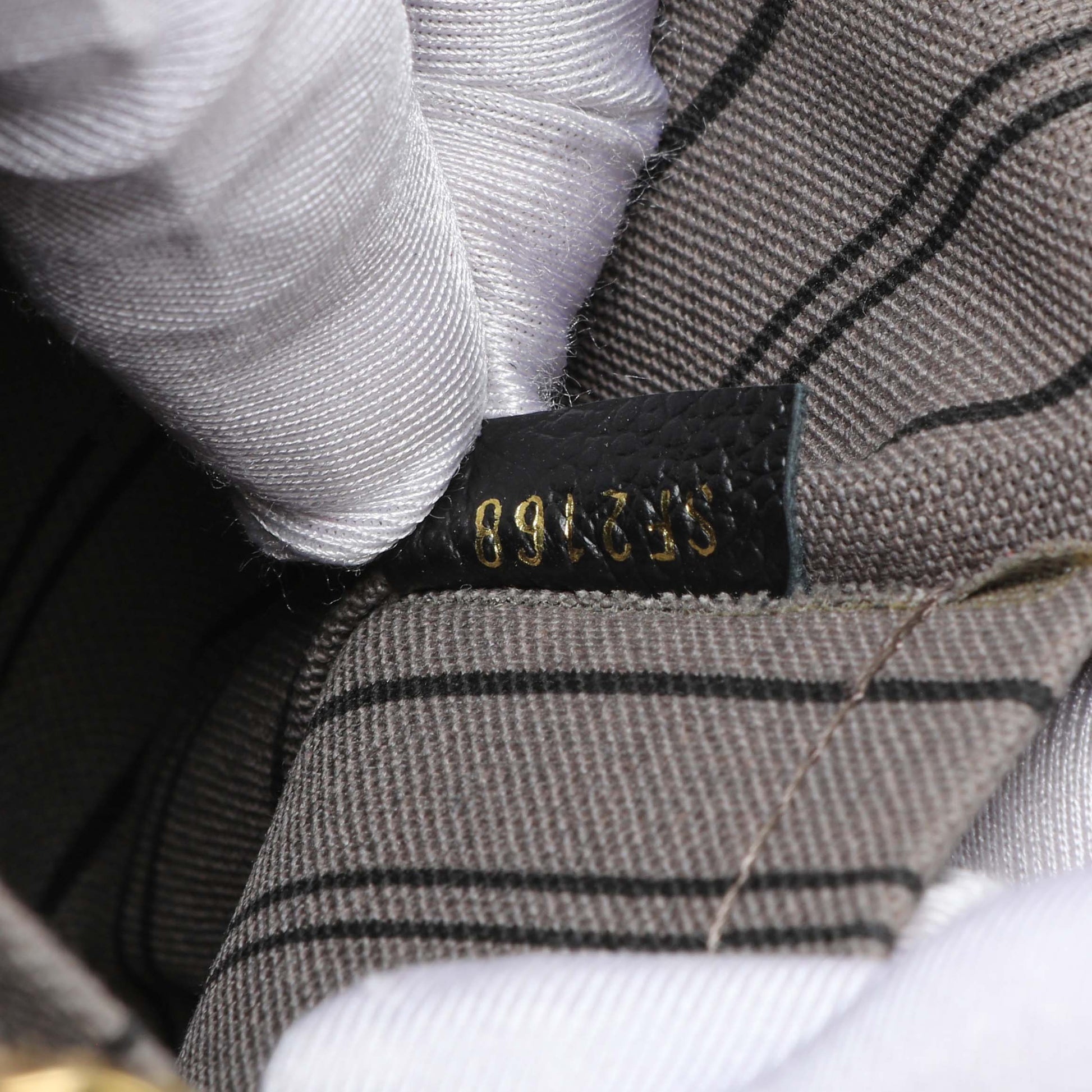 Exclusive Louis Vuitton Black Empreinte Montaigne MM — Lifestyle View