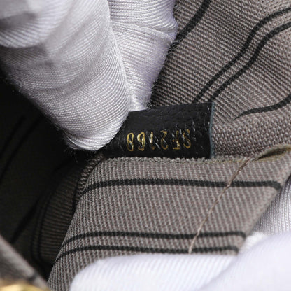 Exclusive Louis Vuitton Black Empreinte Montaigne MM — Lifestyle View