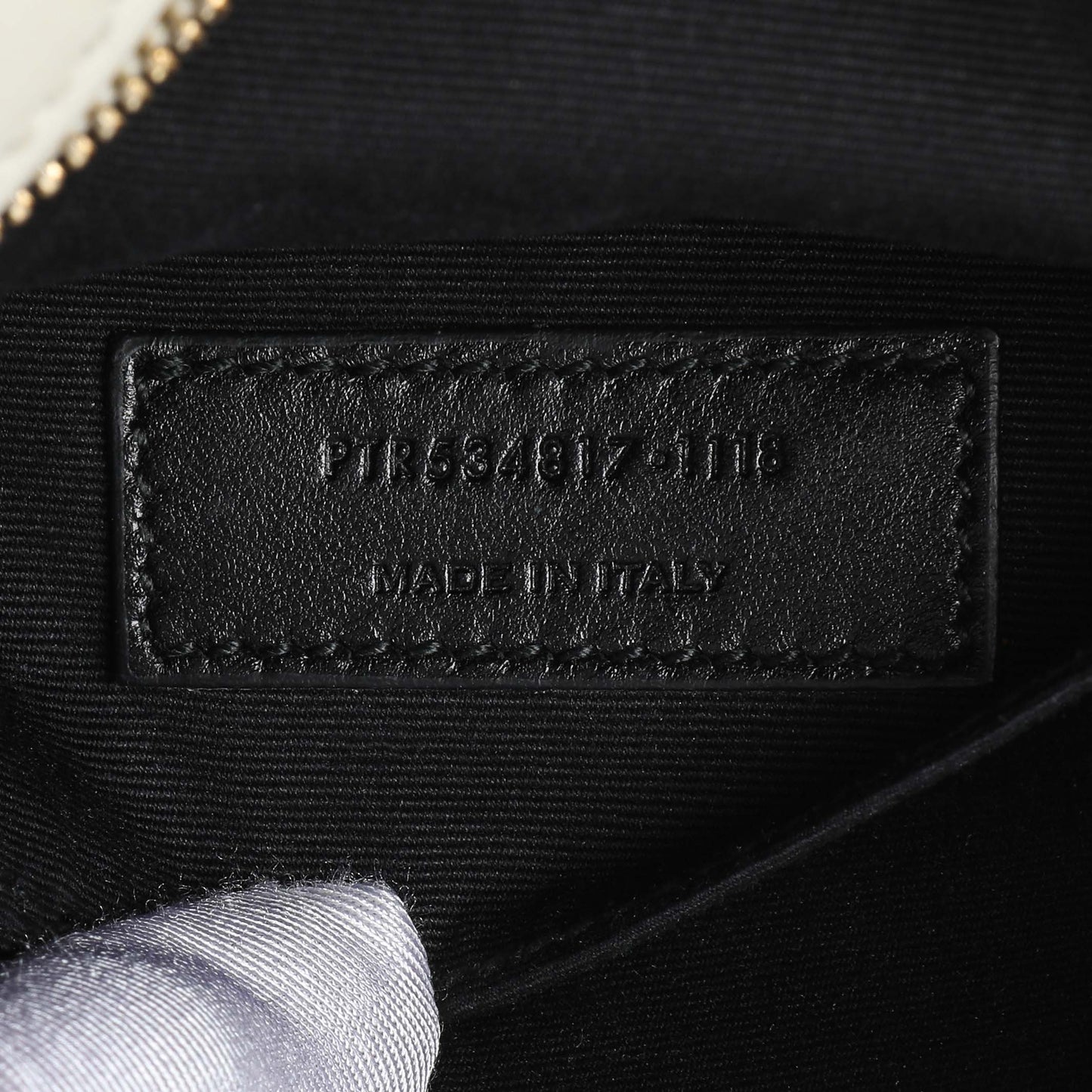 Exclusive Saint Laurent White Grain De Poudre Uptown Baby Pouch — Lifestyle View