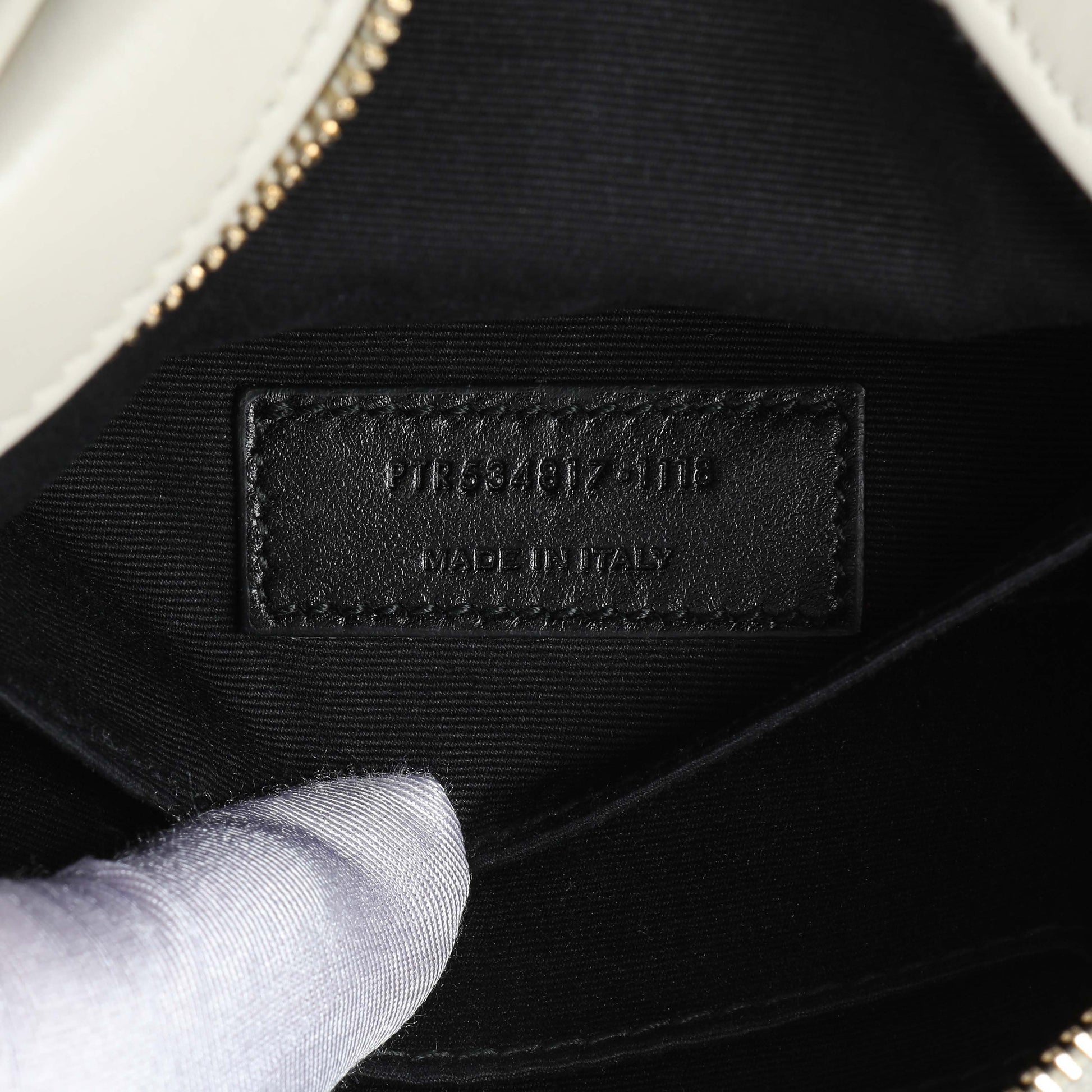 Exclusive Saint Laurent Cream Calfskin Matelasse Monogram Lou Belt Bag — Lifestyle View