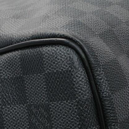 Exclusive Louis Vuitton Damier Graphite Keepall Bandouliere 55 — Lifestyle View