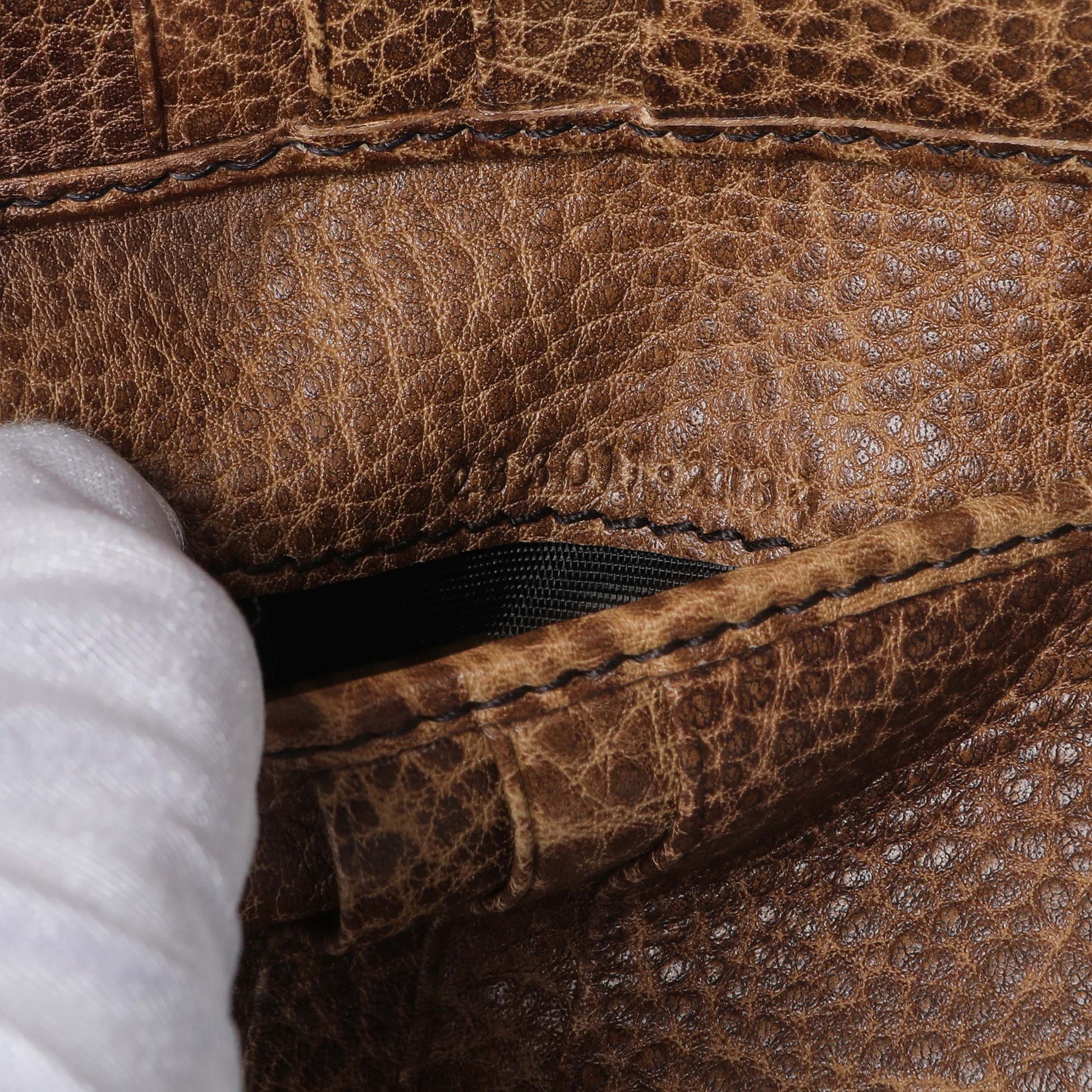 Exclusive Gucci Monogram Compact Flap Wallet — Lifestyle View