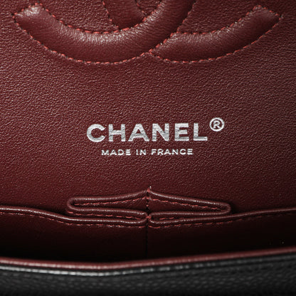 Exclusive Chanel Black Quilted Caviar Medium Classic Double Flap — Lifestyle View