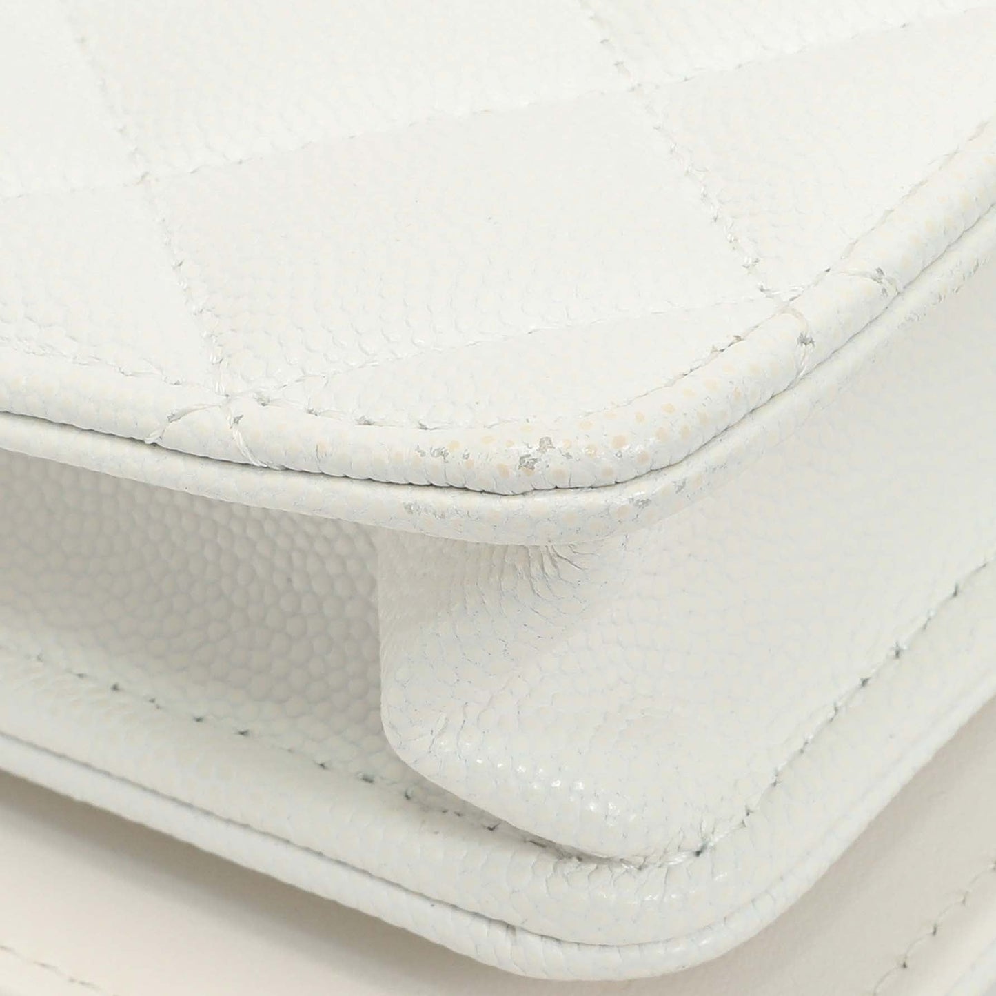 Exclusive Chanel White Quilted Caviar Camellia Chain Flap — Lifestyle View