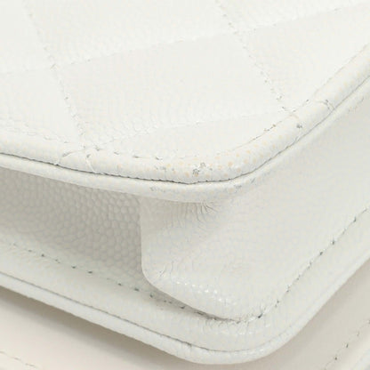 Exclusive Chanel White Quilted Caviar Camellia Chain Flap — Lifestyle View