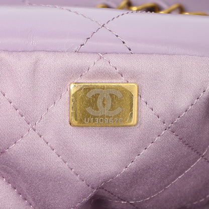 Exclusive Chanel Purple Quilted Shiny Calfskin 22 — Lifestyle View