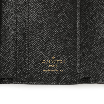 Exclusive Louis Vuitton Monogram Reverse Zoe Wallet — Detail View