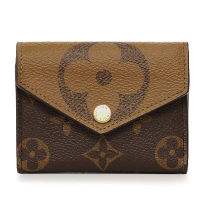 Exclusive Louis Vuitton Monogram Reverse Zoe Wallet — Front View