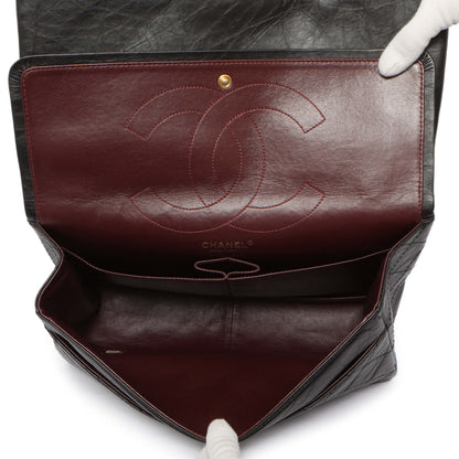 Exclusive Chanel Black Quilted Aged Calfskin 2.55 Reissue Double Flap 227 — Lifestyle View