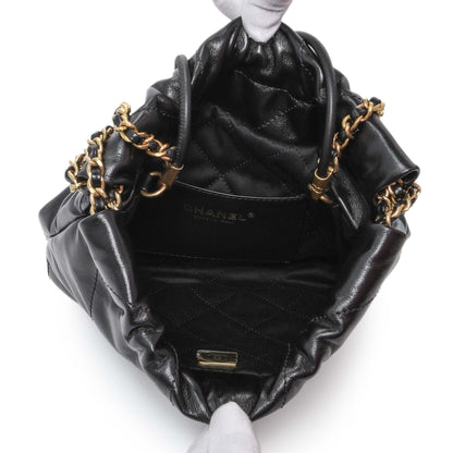 Exclusive Chanel Black Shiny Calfskin Quilted Mini Chanel 22 — Top View