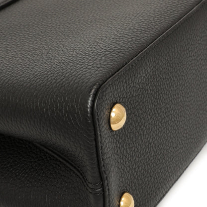 Exclusive Louis Vuitton Black Taurillon Flower Crown Capucines PM — Lifestyle View
